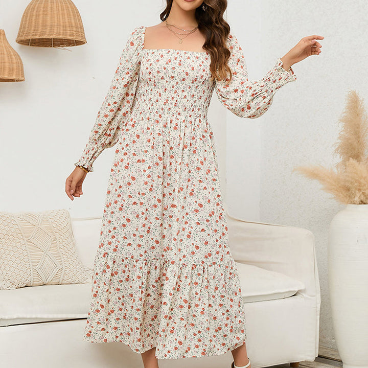 Vasilya - Elegantes Kleid mit Ausgestellten Ärmeln und Floralem Muster